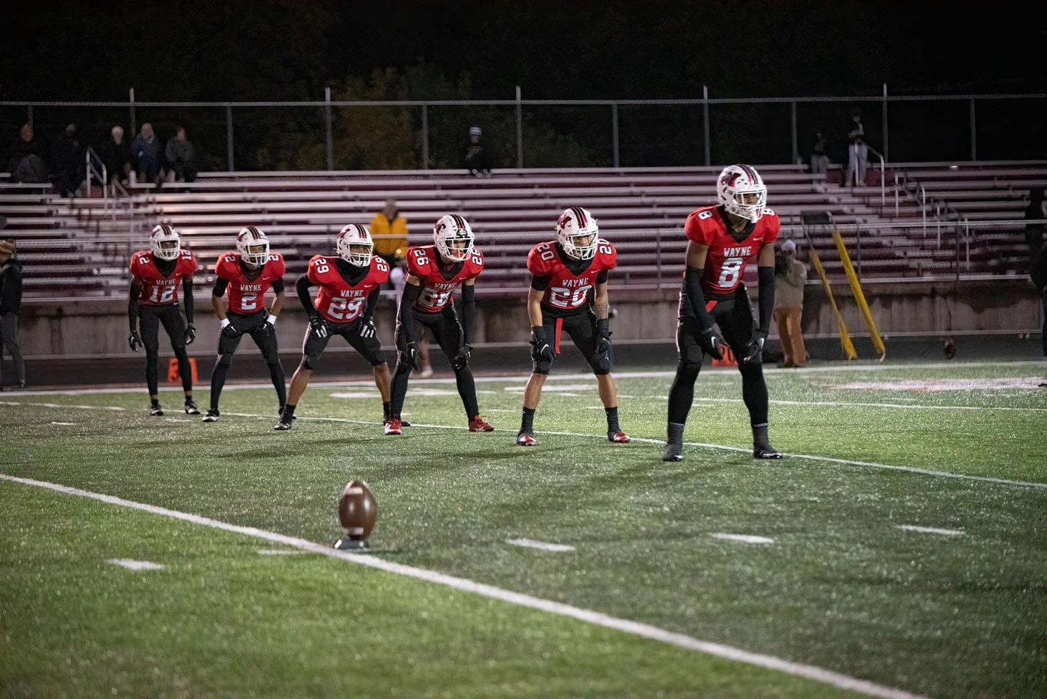 Kickoff team about to kick the ball